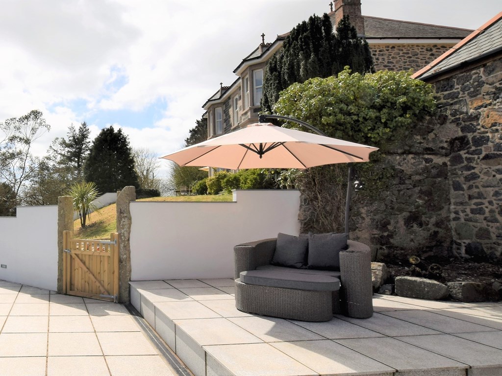The pool terrace with sofa seating